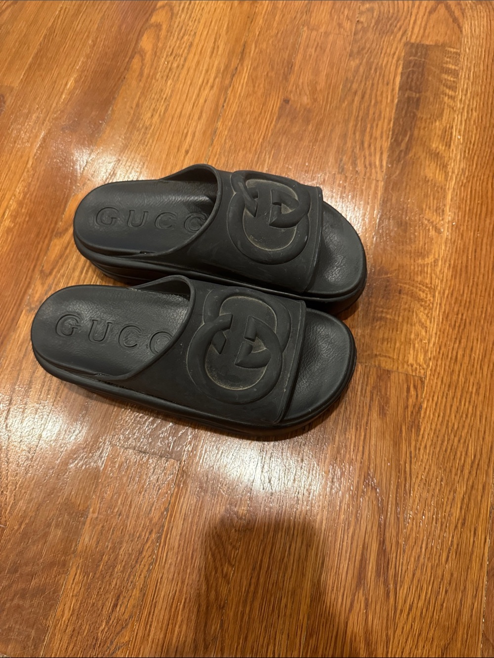 Gucci Black Embossed GG Rubber Slide Sandals